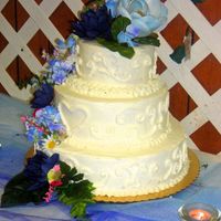 Second View - 20Th Anniversary Cake Another view of the same cake....this picture is alot less forgiving...you can see the cake crumbs that got into the last layer of icing -...