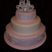 Pink Wedding Cake This is 3 tier Wedding Cake I did, thought it was a pretty cake. Iced in rtr icing which I use alot.