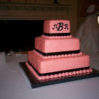 Three Tier Square This was the GROOMS CREATION........Coral Cake (BCF) & Royal frosting Monogram. I also Luster dusted the letters.