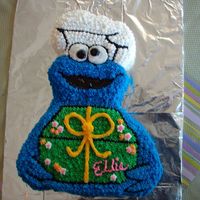 Cookie Monster Cake I made this cake for a friend of mine. It was my first character cake.