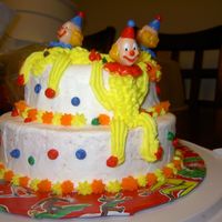 Good Ol' Wilton I Clown Cake They got a little squished on the way home. Cake carrier wasn't tall enough!