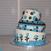 Baby Shower Cake My first topsy turvy cake and cup cake buquets.