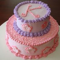 Katelyn's 1St Birthday Bottom white cake, top marble cake, iced in BC with fondant roses. Last minute cake for friend