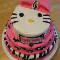 Hello Kitty This is a 6"/8"/10" covered in buttercream. All accents are fondant...so much fun to do!!