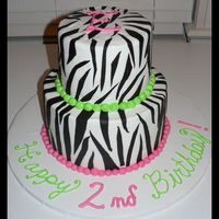 Zebra Fun 6" chocolate and 9" white cake. Zebra stripes made with black tinted chocolate fondant.
