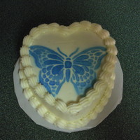 Asortment Of Mini's All yellow cake with carmel filling and buttercream icing......different shapes, heart, round, oval. duck an dress..................