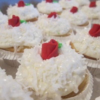 Snowy Coconut Cupcakes Coconut Snowball Cupcakes - coconut cake topped with coconut cream cheese frosting, shredded coconut, sprinkles, cake sparkles and a royal...