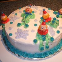 Clown Cake This is one of my first cakes, I went a little overboard on the frosting, but it was delicious!