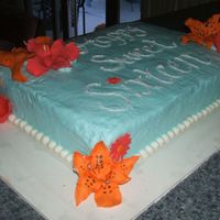 Sweet Sixteen Cake This is a sweet sixteen cake i made for one of my friends. The flowers are all gumpaste, everything else is buttercream frosting.