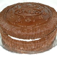 Oreo Cake cake for one of the guys that work for me. Chocolate cake with chocolate frosting. Filling of ccokie white cake with mmf.