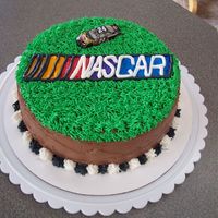 Nascar Cake This is a cake I made for my fathers B-day. He is a Nascar fan. Chocolate fudge cake, cookies and cream filling. Thanks for all of the...