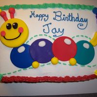 Baby Einstein Caterpillar This is a cake I made for my nephew's 1st birthday. I was happy with the way that it turned out. Buttercream frosting. Fondant accents...