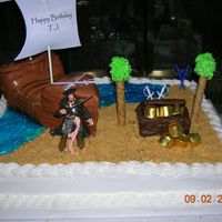 Pirates Of The Carribbean This was for a little boy's birthday. I could not show it here, but I had a picture of him on one of the sails. Yellow cake with BC...
