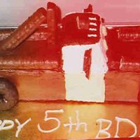 Tow Mater Side View This is the side view of the cake.I use twix candy bar for tow.