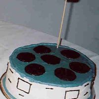 Movie Reel First try at making a movie reel cake. For my mom 60th b-day theme was Hollywood Stars. Cake was vanilla with b/cream.
