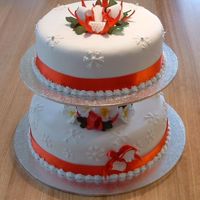 Celebration Cake - Christmas My celebration cake with a Christmas theme. Also my first attempt at making the orchids and frangipanis.