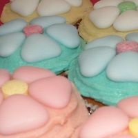 Flowers Made these flowers with heart shaped sugar coated chocolates and put a lolly in the middle.