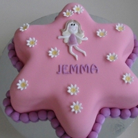 Pink Star For a little girl's fairy-themed 4th birthday. Vanilla cake with raspberry buttercream. Covered in white chocolate ganache then...