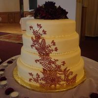 More Mehndi/henna Design I painted this cake in Gold Lustre Dust and the mehndi design was done in a deep red, the largest cake I've done a 12", 14"...