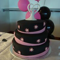 Bubblegum Pink Daisies The groom actually designed this cake, I figured out after making my fondant as dark as I could that I could airbrush it and the black...