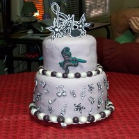 Purple Ninja Cake This was for my sister's 12th Birthday. She wanted a Justin Bieber/purple ninja cake and she helped design it. 8" and 6"...