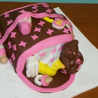 Brown & Pink Diaper Bag Cake 8" square vanilla cake, chocolate ganache filling, vanilla buttercream, chocolate fondant and pink vanilla fondant, rice krispie treat...