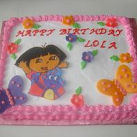 Dora Birthday Cake This was a cake for my friends 3 year old daughter. Her aunt actually made the cake, I did the dora color flow and the fondant butterflies...