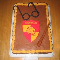 Harry Potter Cake This was for a coworkers birthday who LOVES Harry Potter! Yellow cake with chocolate buttercream icing. Glasses and wand are fondant/...