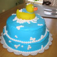 Rubber Ducky Cake Cake is chocolate. BC icing and "bubbles". Ducky is real. This cake got rave reviews at the restaurant the shower was held at!...
