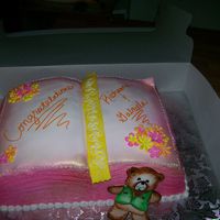 Book book cake carved from 2 11x15 sheets ( i don't have the book pan grrr) iced with buttercream,the inside pages and flowers are fondant...