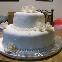 White With Gardenias client wanted white tiered cake for funeral... so I had some sugar gardenias i bought on clearance and here ya go. I thought it came out...