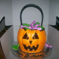 Candy Bucket my friend wanted a candy bucket for her sister's birthday. 3 layer chocolate cake 7"8"7" stacked and carved a little to...