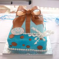 Shower Gifts 10" sq and 7"square stacked both covered with fondant. Pastillage bow, fondant decorations.