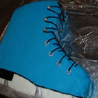 Ice Skate I made this cake for a friend of my daughter's, who had an ice skating birthday party. This was my first 3-D cake.
