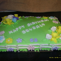 Garden Cake Made this for a lady who is in a nursing home. She loves daffodils and other flowers.