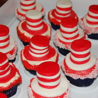 Happy Birthday, Dr. Seuss 'Cat in the Hat' cupcakes I made for my son's preschool class to celebrate Dr. Seuss's birthday. Buttercream frosting...