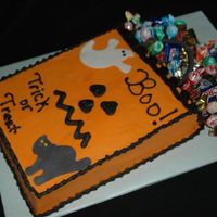 Trick Or Treat Bag I made this for a friend's nursery school class this year. Buttercream icing with fondant handle, ghost and cat.