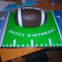Football Cake Yellow cake with chocolate buttercream (egg :) football. Fondant covered cake board.