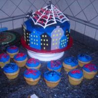 Spider Man Buttercream with fondant accents. Royal icing web cake topper