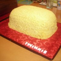 Twinkie Yellow cake with raspberry filling. Covered with buttercream. This cake was made for a man they call "twinkie" who was turning 40...