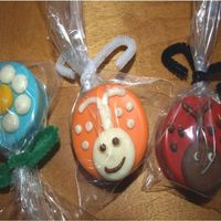 Oreo Garden Friends Oreo Cookies covered in white chocolate and colored. My daughter wanted little Garden Friends as she calls them!