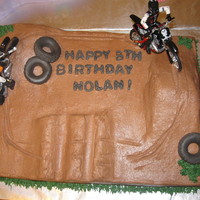 Dirt Bike Cake Simple cake... not much you can do with a dirt bike cake.