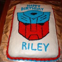 Transformer Pressed outline and then filled in buttercream icing