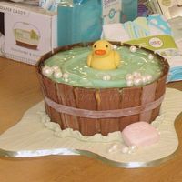Ducky In Wooden Tub Wooden tub slats made with wood grain fondant. Duck is fondant, water is made from a homemade candy much like gummy worms. Looks and tastes...