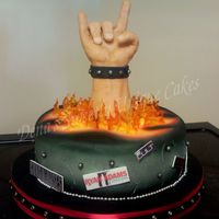 Fist Of Rock Cake This is my version of the Ace of Cakes Fist of Rock cake. It was requested for a birthday party and had to travel a good two hours for...