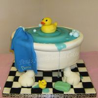 Duckie In A Bathtub 3-13 inch oval cakes. Holes were pre drilled in the board and large Wooden Dowels are screwed into a 14x18 3/4 inch plywood board AFTER THE...