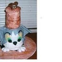 Tom And Jerry Cake This is my first cake that I have made. I followed a book lay out by Debbie Brown. I was really happy with how it came out.