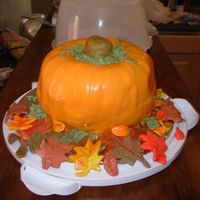 Pumpkin Cake This was for a pumpkin-themed baby shower. It is my first shaped cake and I think it came out very well.