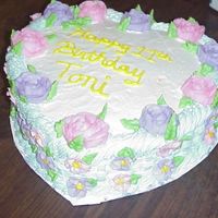 12" Heart Shaped 2 Layer my 11 year old niece decided she was too old this year for a character cake so she requested a grown up cake. Thanks for looking