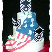 Air Force Promotion Cake 3 Tier: 12, 9, & 6. 12- White cake w/ raspberry filling....9-Devils food cake with whipped chocolate ganache filling......6-yellow cake...
